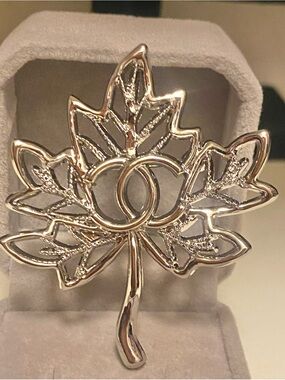 Fashion Jewelry Gold-Tone Maple Leaf Brooch with Interlocking Motif